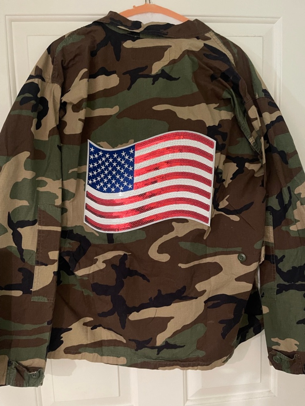 Prestige Tactile Military jacket with sequin American flag on the back.